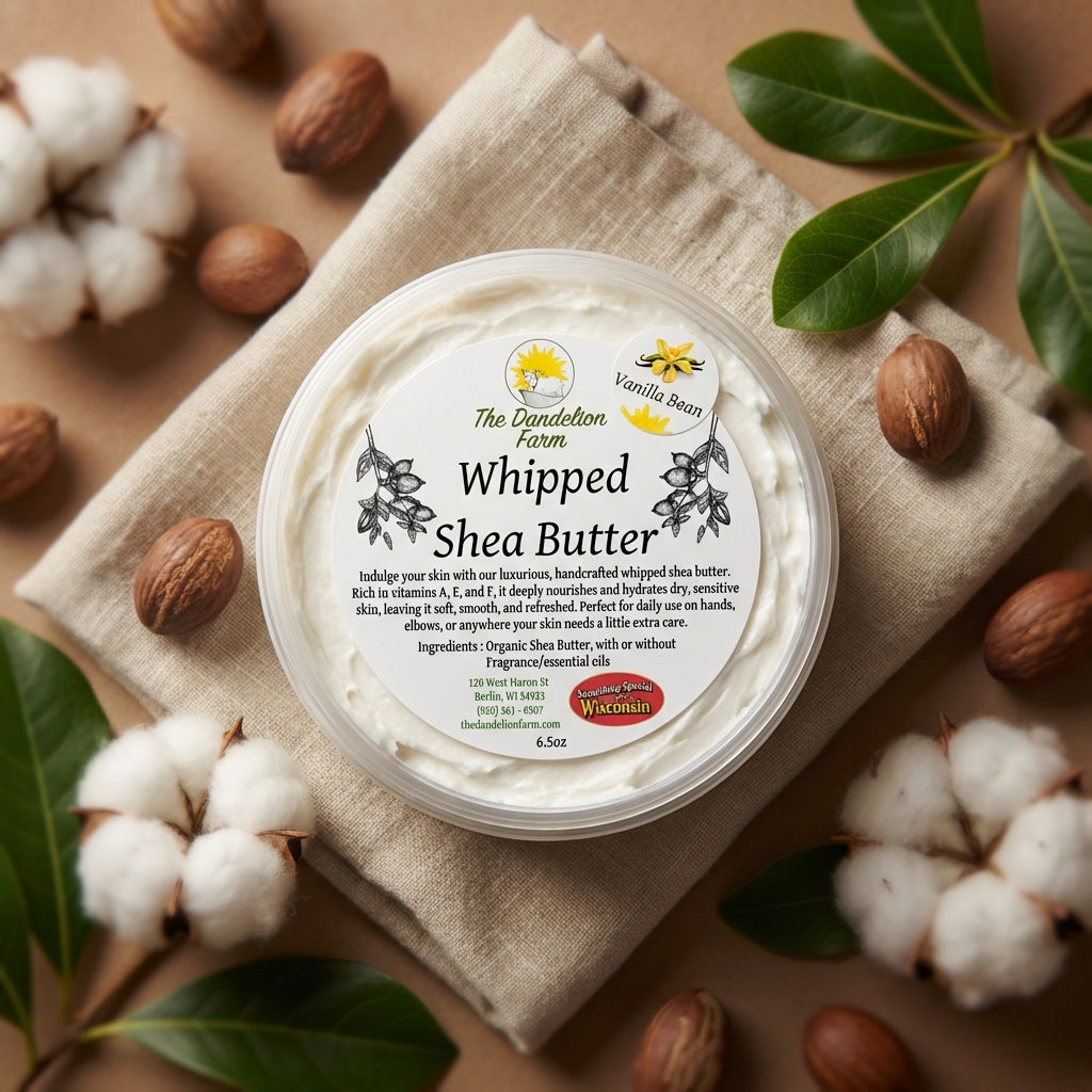 An elegant, cinematic overhead shot of a jar of whipped shea butter, surrounded by natural shea nuts, lush cotton flowers, and soft shea leaves, arranged artfully on a textured linen cloth. The scene is illuminated with HDR studio lighting, highlighting th