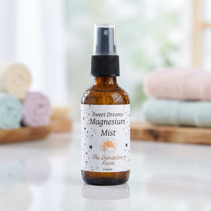 A high-resolution studio shot of the 'Magnesium Mist' bottle, captured from a slightly elevated angle with a shallow depth of field, showcasing the sleek, frosted glass container with condensation droplets. Softbox lighting gently illuminates the product, 