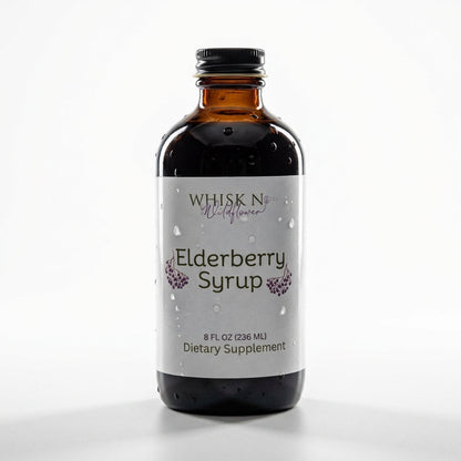 A sophisticated, HDR studio shot of the elderberry syrup 2 oz bottle, shot from a slightly elevated front view with a macro lens to emphasize the texture of the label and the glass. The lighting uses rim lights to create a glowing edge around the bottle, e