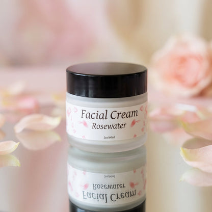 A luxurious scene featuring the Rosewater Facial Cream in a high-end skincare product shot, captured with a softbox lighting setup that emphasizes the cream’s smooth, elegant packaging. The image is taken at a slightly elevated angle using a 50mm lens with