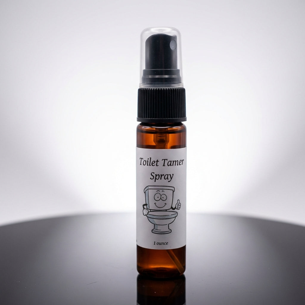 A high-resolution studio shot of the 'Toilet Tamer' spray bottle, positioned front and center on a sleek, reflective black surface that emphasizes its modern design. Softbox lighting creates a gentle, even glow that highlights the transparent glass of the 
