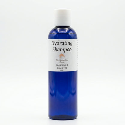 A close-up macro shot of the shampoo bottle set against a clean, white background with a softbox lighting setup to eliminate shadows. The focus is on the textured, eco-friendly label and the sleek, curved design of the bottle, highlighting the natural ingr