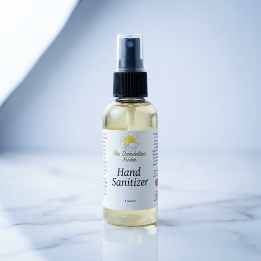 A sleek, high-resolution studio shot of the 4oz hand sanitizer bottle, captured from a slightly elevated angle with a macro lens to emphasize the textured aloe vera gel base and the clear, refreshing liquid inside. Softbox lighting creates gentle highlight