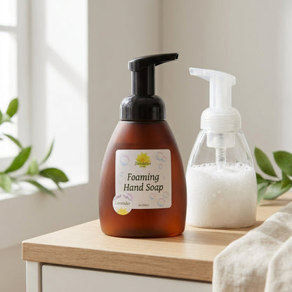 A detailed product shot of a refill bottle of foaming hand soap in a sustainable, eco-friendly packaging, positioned on a minimalist wooden countertop. The scene is lit with diffused daylight from a nearby window, creating gentle shadows and emphasizing th