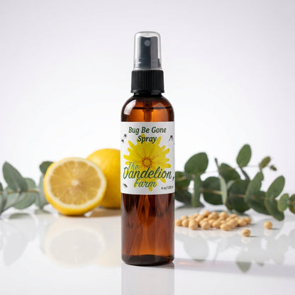 A high-resolution macro shot of the 'Bug Be Gone Spray' bottle, positioned centrally on a sleek, reflective surface in a professional photography studio. The scene uses softbox lighting to emphasize the transparency and texture of the clear plastic bottle,