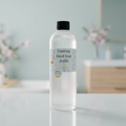 Create a high-resolution image of a sleek, modern foaming soap refill bottle positioned prominently in a minimalist bathroom setting. Utilize softbox lighting to highlight the smooth, translucent plastic with a subtle frosted finish that reflects light gen