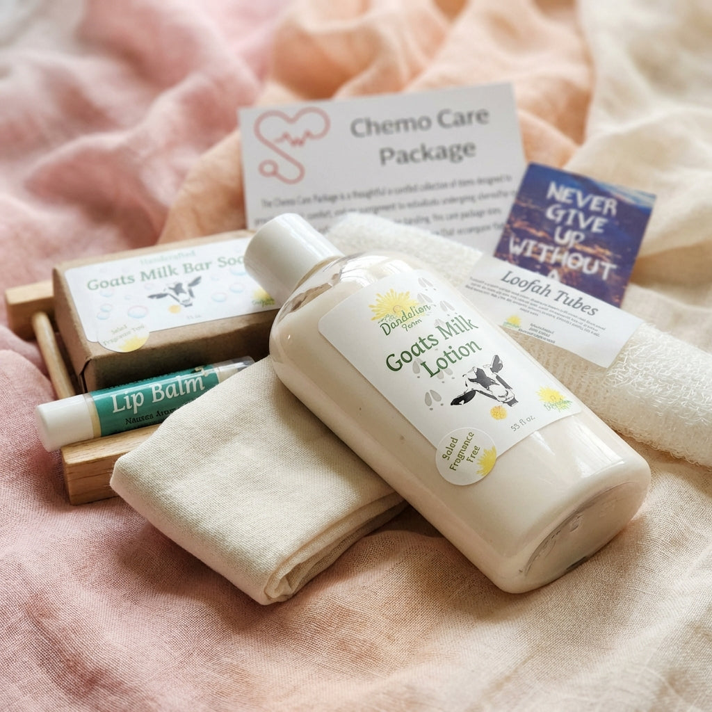 An artistic, close-up product shot of the 'Chemo Care Package' items artistically arranged on a delicate, textured fabric backdrop in soft pastel shades to evoke tenderness. The shot is taken with a macro lens at a 100mm focal length, focusing sharply on t