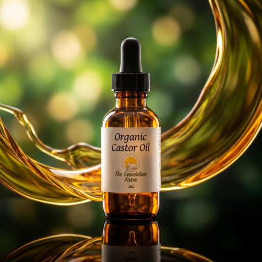 Compact amber castor oil bottle on black reflective surface with glowing oil swirls and green-golden bokeh, macro shot highlighting purity.